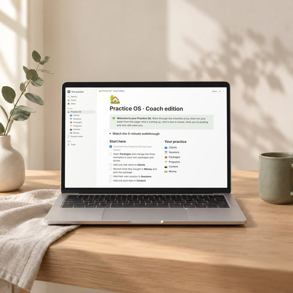 The Practice OS Coach edition dashboard open in Notion on a laptop on an oak desk